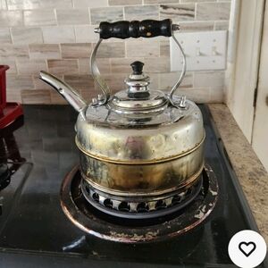 Copper whistling tea kettle